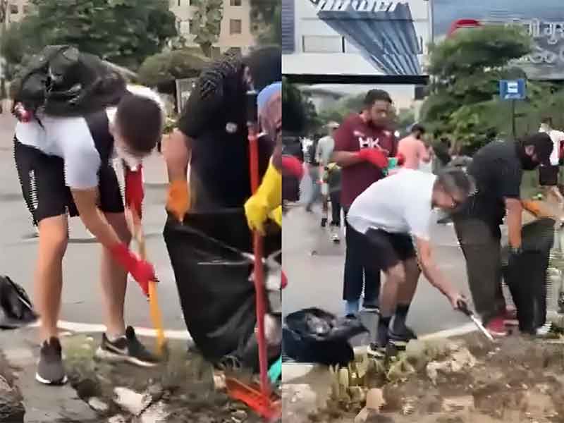 ravinitesh's tweet card. Recently, due to rain, waterlogging was a common sight in many parts of Delhi-NCR. Amidst this, a cleanliness drive by some foreign nationals in Gurgaon, who gathered garbage from around the roads…