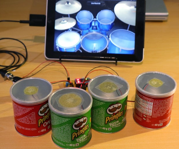HowToSolve's tweet card. Pringle Can MIDI Drums: Ever wanted to unleash your inner rock god, but couldn't find the space to put a drum kit? Frustrated at trying to play GarageBand with fat fingers? Or just someone who can't...