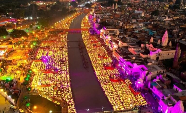 BengaluruWire's tweet card. Ayodhya's 9th Deepotsav on October 19 aims for a new world record, lighting 28 lakh (2.8 million) diyas along the Saryu ghats. CM Yogi Adityanath to attend the grand Diwali prelude.