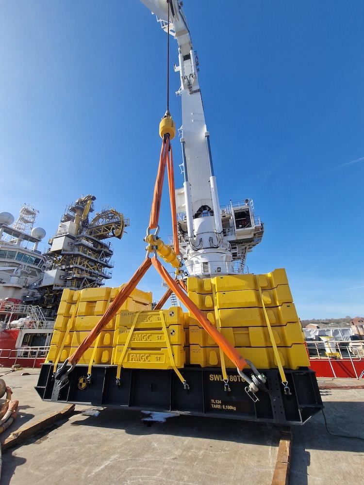 HeavyLiftPFI's tweet card. A Modulift spreader beam was used recently in the northeast of England to support the recalibration of a vessel's crane for a national ship repair company.
