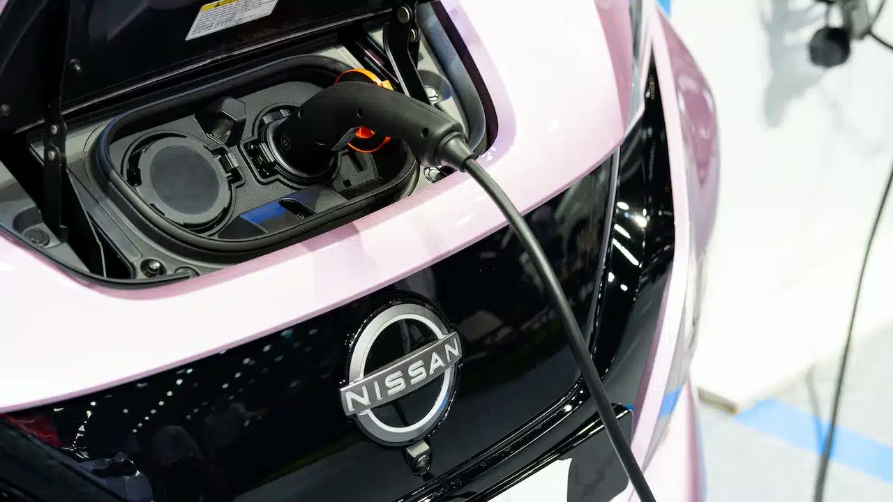TopClassActions's tweet card. A new class action lawsuit alleges Nissan North America misled consumers about the charging capabilities of its Nissan Leaf EV.