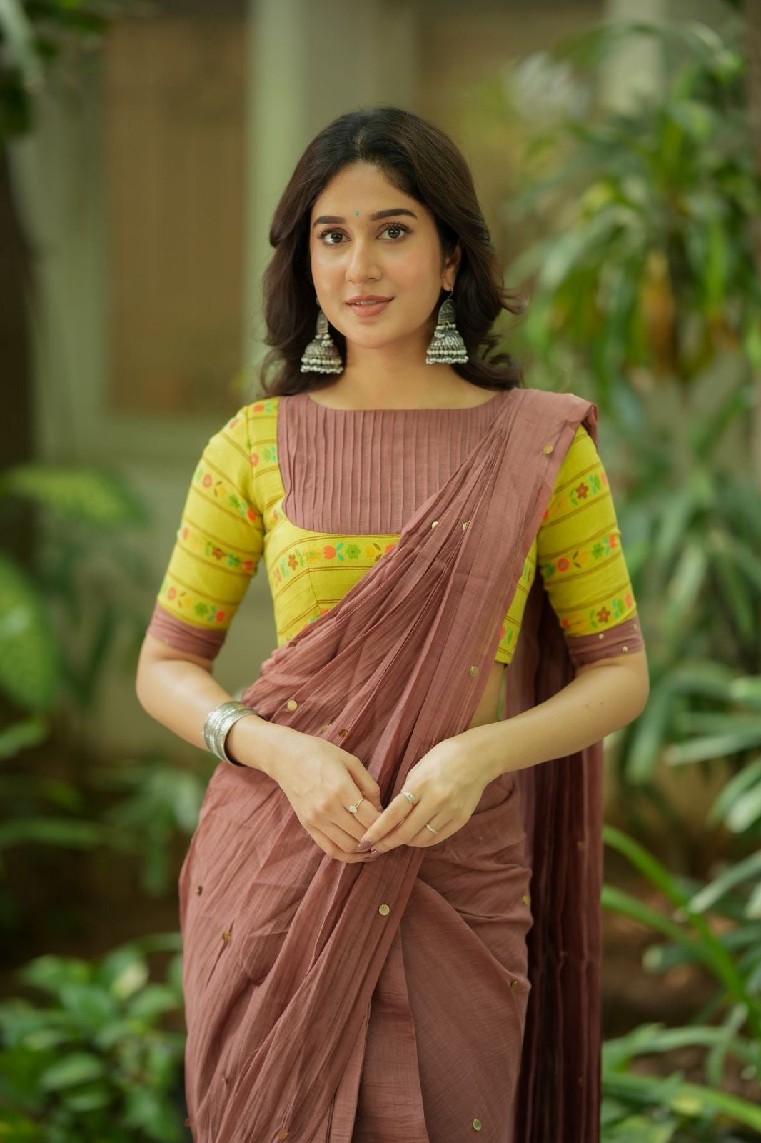 Threadsshobi's tweet card. Brown pure malai chanderi cotton saree comes with embroidery works all over saree is paired up with parrot green mul cotton having floral prints all over blouse and highlighted patterned works for...