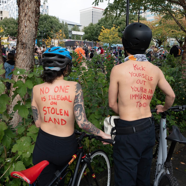 cowtowncoder's tweet card. The World Naked Bike Ride on Oct. 12 sought to bring global attention to President Donald Trump’s plans to deploy National Guard troops to the city.