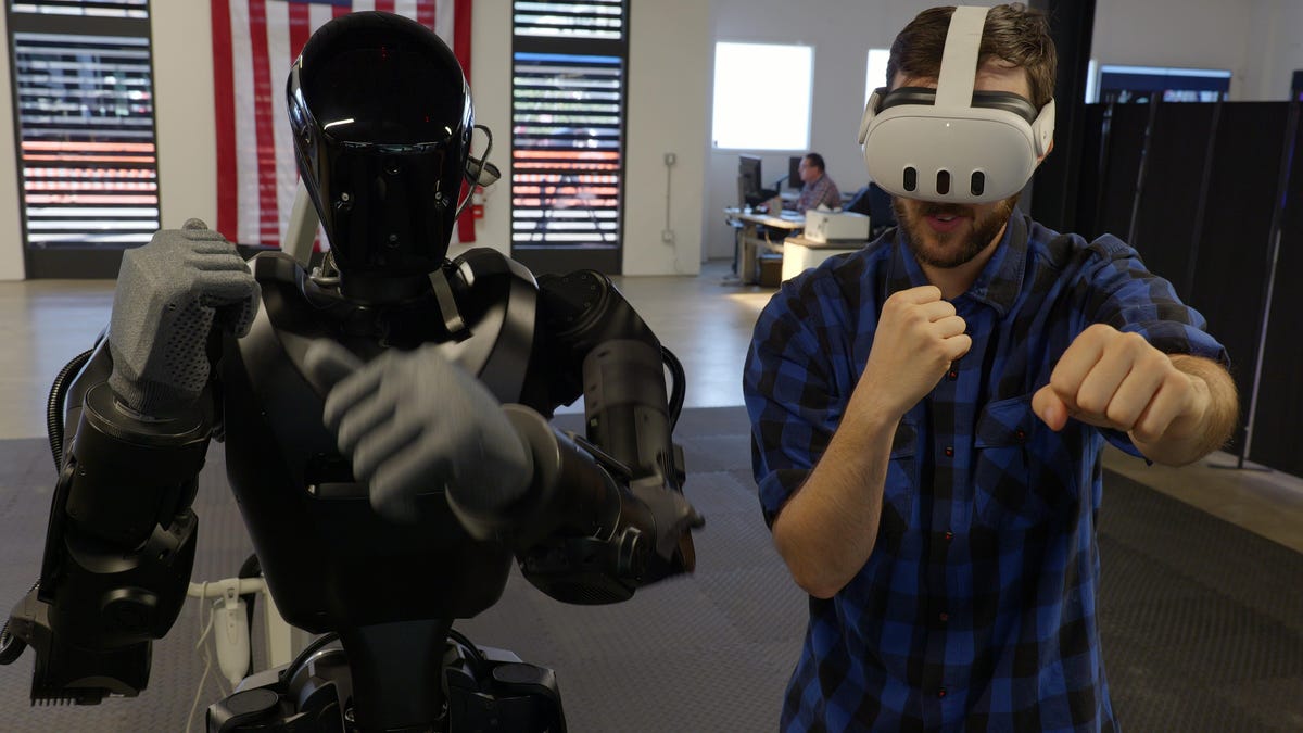 CNETNews's tweet card. At Foundation's headquarters in San Francisco, I met the Phantom MK1 humanoid robot and controlled it using a VR headset. The CEO told me his aspirations to deploy the robot in factories, on battle...