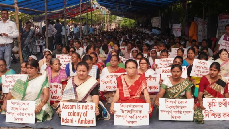 NENowNews's tweet card. Regional political resistance in Assam is fueled by indigenous land movements against corporate exploitation and govt's betrayal.