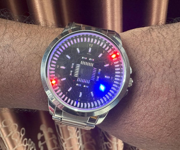 MicrochipMakes's tweet card. LumiDial: a 72-LED Analog Wristwatch Powered by ATmega328: LumiDial is a custom-built wristwatch that blends classic analog style with modern LED technology. Instead of using physical hands, it uses...