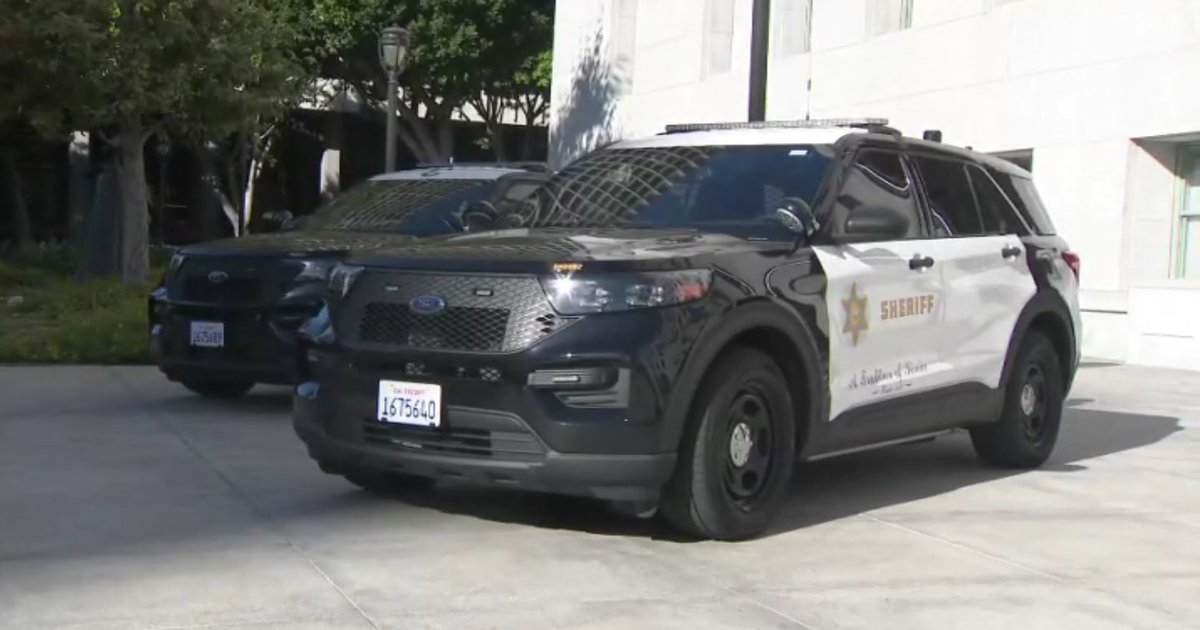 rhsvcs's tweet card. Los Angeles County deputies found Mitt Romney's sister-in-law, Carrie Romney, 64, dead outside a shopping center. They do not believe foul play was involved.