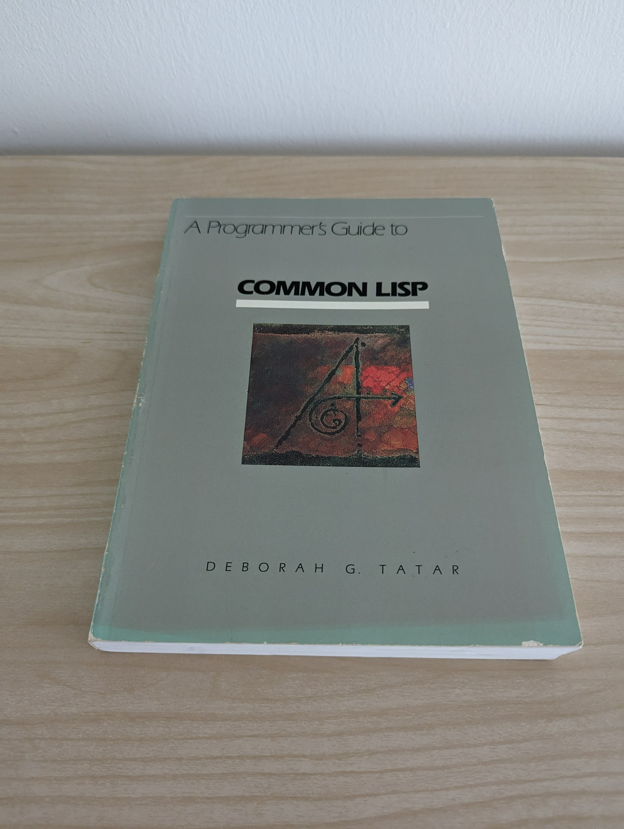 batman_in_samt's tweet card. I got a cheap used copy of the book A Programmer's Guide to COMMON LISP by Deborah G. Tatar, Digital Press, 1987. Why did I read such an...