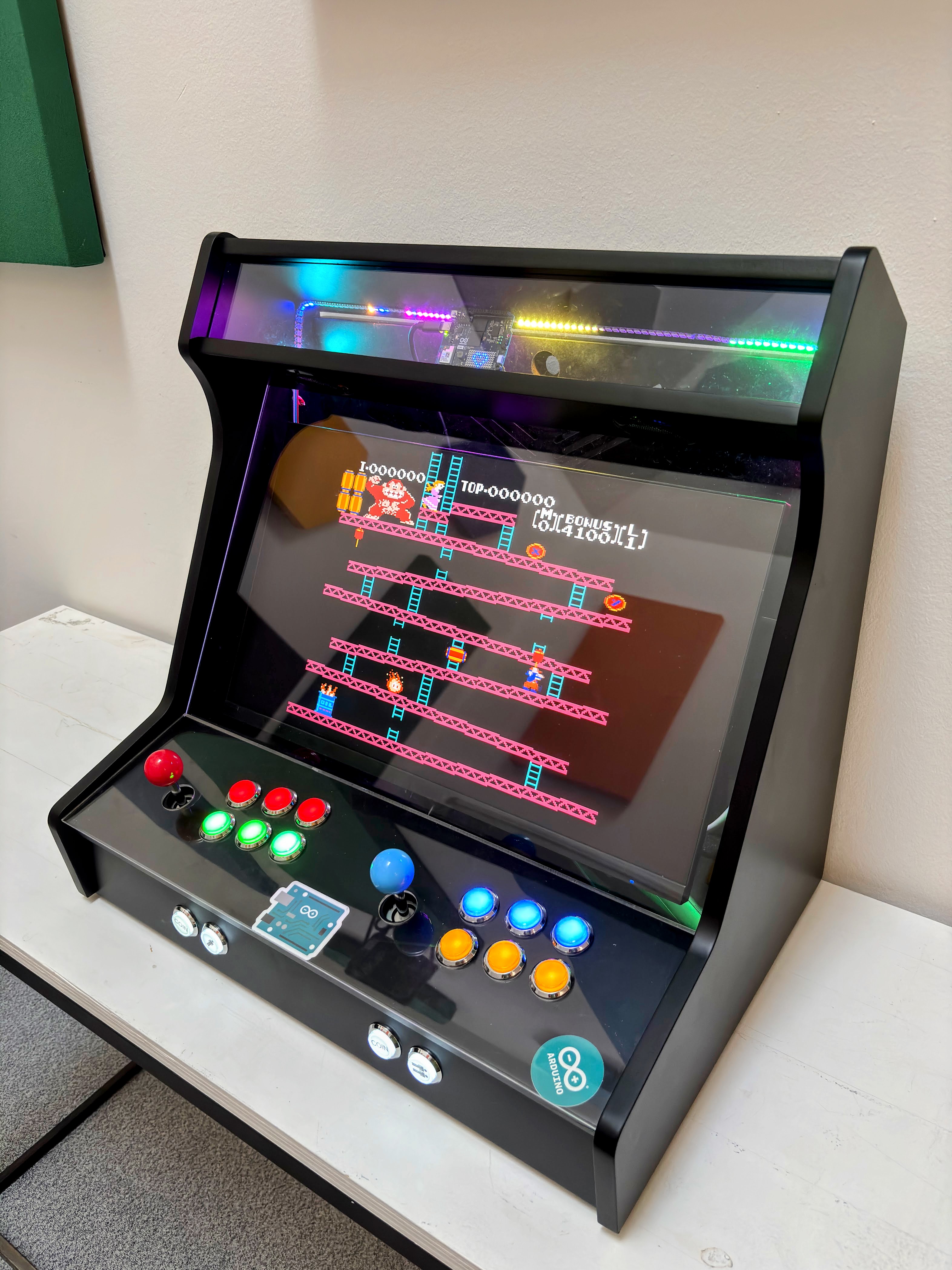 arduino's tweet card. Create your own Arcade Cabinet Machine at Home using the Arduino UNO Q!