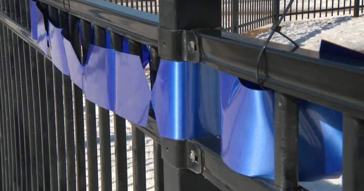 GlobalEdmonton's tweet card. The Edmonton school named after the last officer to die on the job once more strung up ribbons in solidarity for the newest officers to join that short, but devastating list.
