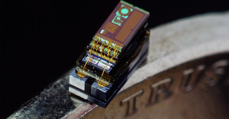 VBNET_WiFi's tweet card. The Michigan Micro Mote has taken "tiny" to a new level. The M^3 computer can fit seamlessly along the edge of a nickel.