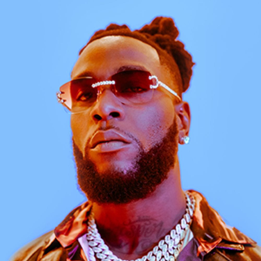 React_TechBoy's tweet card. Burna Boy Shocked The World with his rise to global stardom has been nothing short of extraordinary. With a blend of rich Afrobeat rhythms