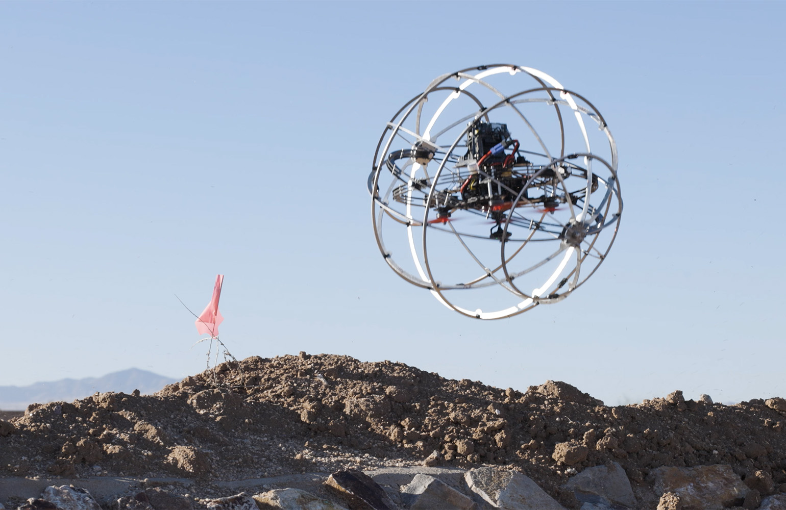 iotguide's tweet card. Revolute offers a unique robot that can drive on the ground to extend battery life and fly when it needs to get around obstacles.