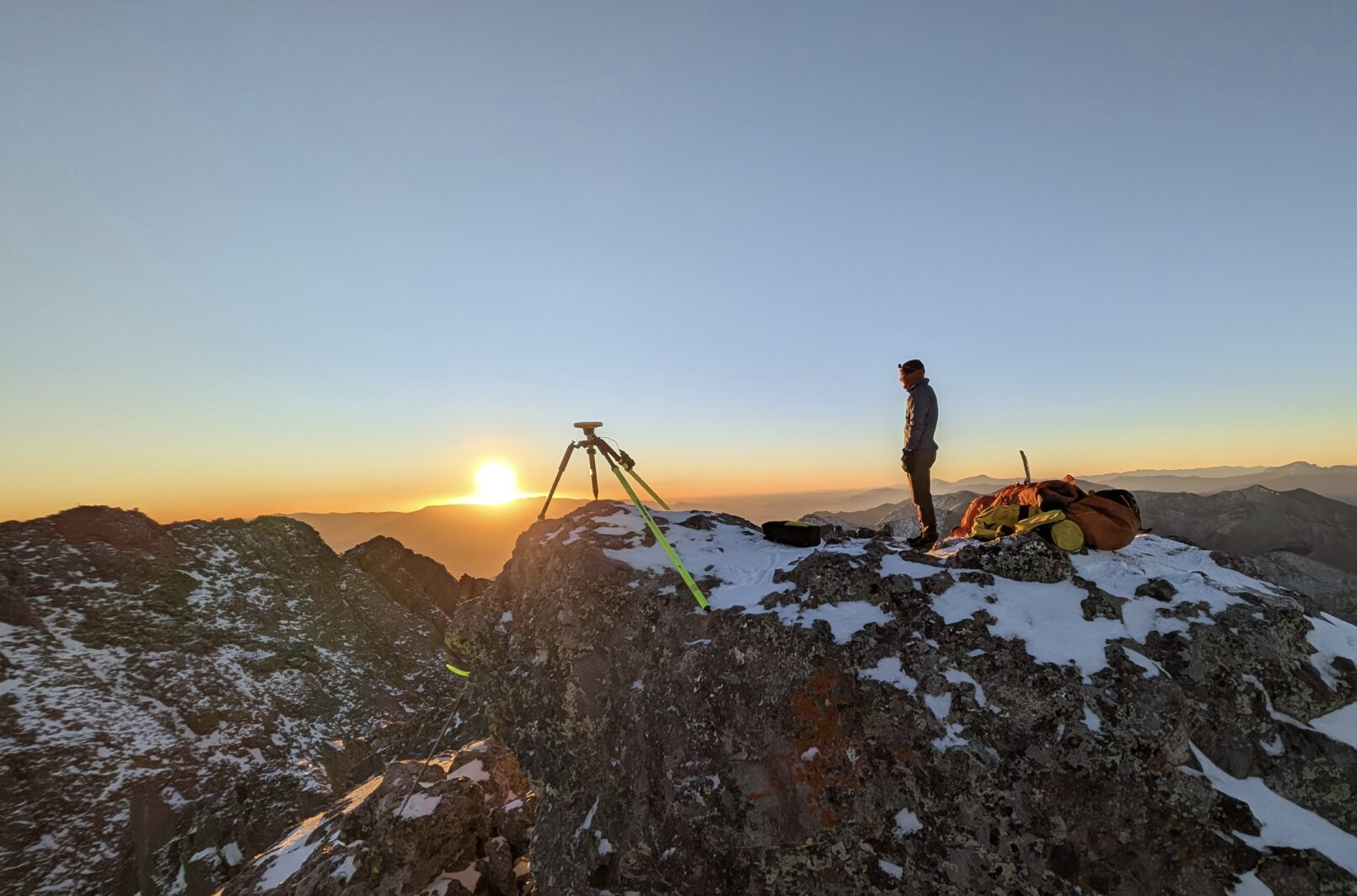 ExplorersWeb's tweet card. Eric Gilbertson climbed Crestone Peak carrying loads of geological survey equipment to measure the summit's true elevation.