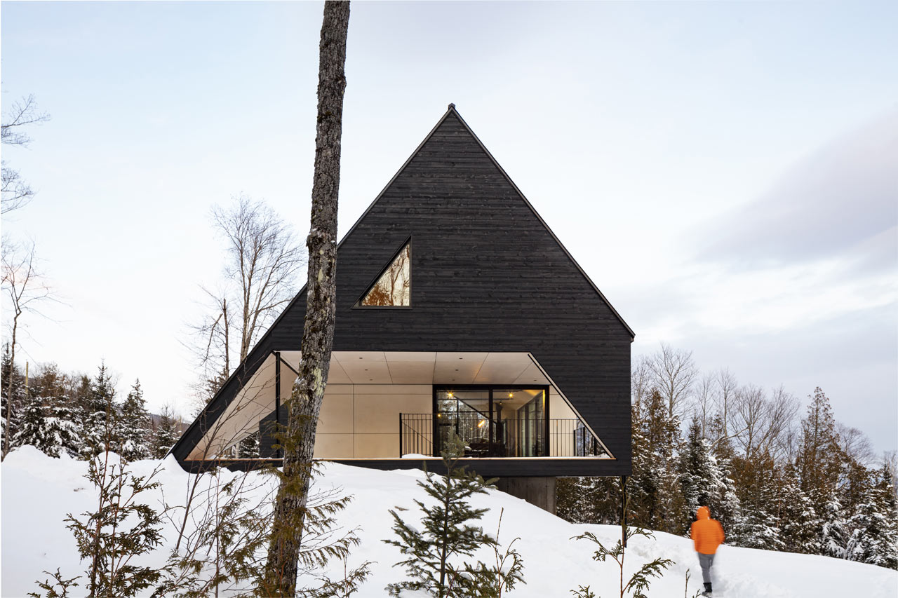 ProjectcoreInc's tweet card. Cabin A, by Bourgeois / Lechasseur architectes, rests on a steep slope in the Charlevoix region with an A-frame design that gives nod to naval architecture.
