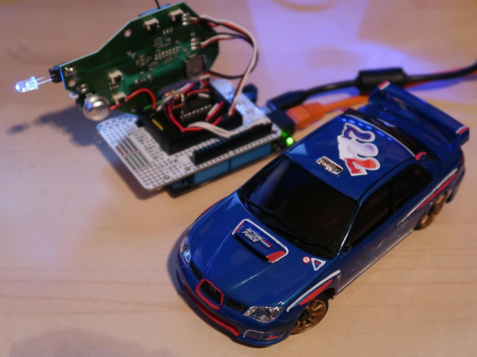 IShJR's tweet card. Drive a radio-controlled car via a RESTful API using any internet-enabled client!