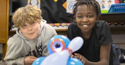 jrushing72's tweet card. Meadow Lane fifth graders tested out their coding knowledge Thursday by programming small, blue robots to hit plastic bowling pins and avoid obstacles.