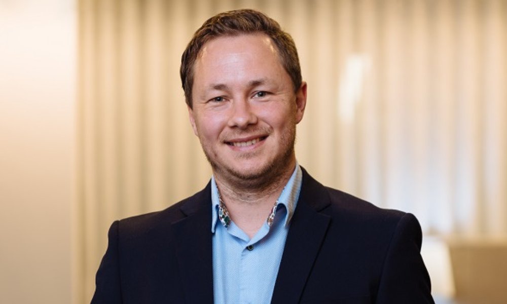 MortgageChat's tweet card. Senior underwriter gets promoted to the newly created role