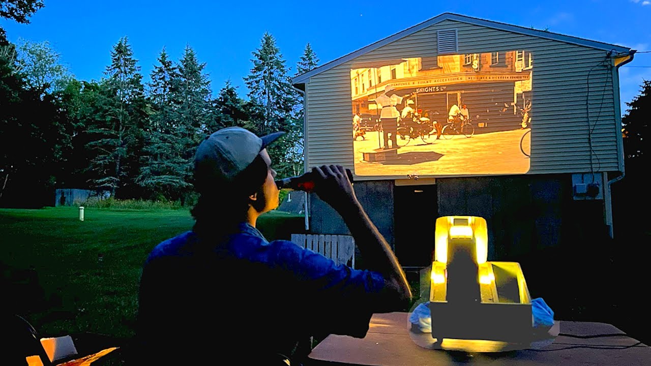 usenetnerd's tweet card. Drinking A Beer & Projecting 1970's Photo Slides On The Side Of My...