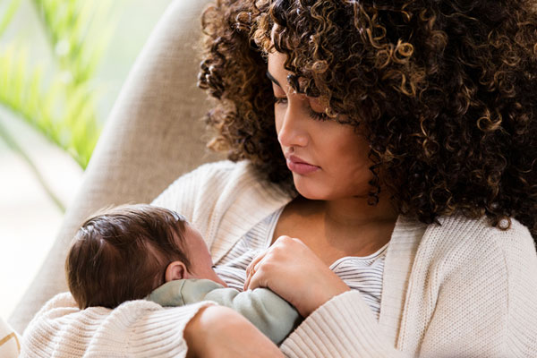 speechwoman's tweet card. The detailed document with multiple illustrations provides evidence-based insights on identification and management of ankyloglossia and related breastfeeding difficulties in infants.