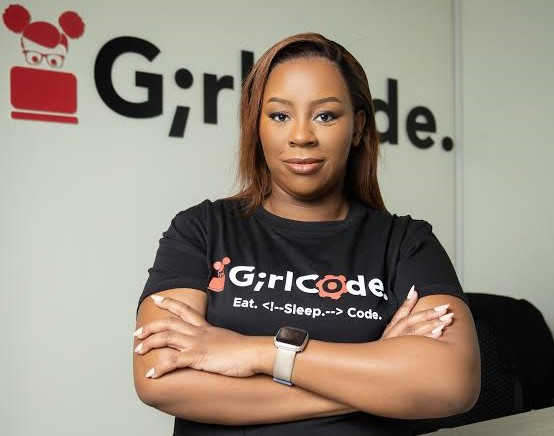 TheBenchmark22's tweet card. Zandile Mkwanazi is empowering South African women with essential coding and tech skills, reshaping the future of technology via GirlCode.