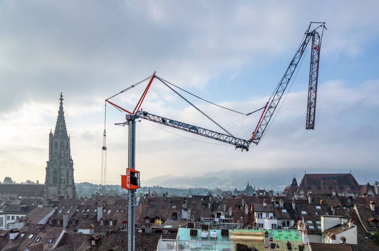 HeavyLift_News's tweet card. The new Liebherr MK 120-5.1E mobile construction crane is ready to go. No sooner had it been delivered than Zaugg’s new 5-axle crane was already in the centre of Bern – ready for a tailor-made job in...