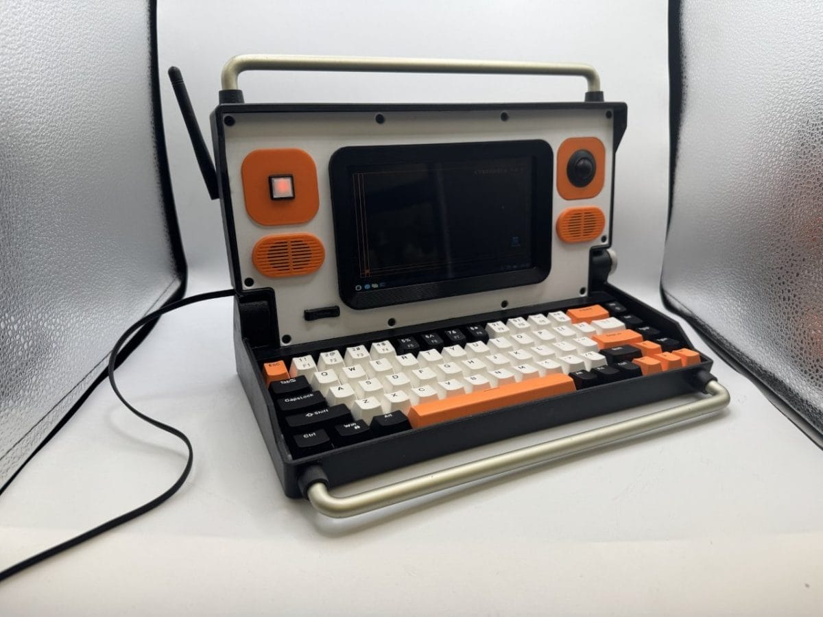 Console_Classic's tweet card. Step into the 70s sci-fi vibe with this bold, DIY cyberdeck briefcase laptop that blends retro style and modern tech.