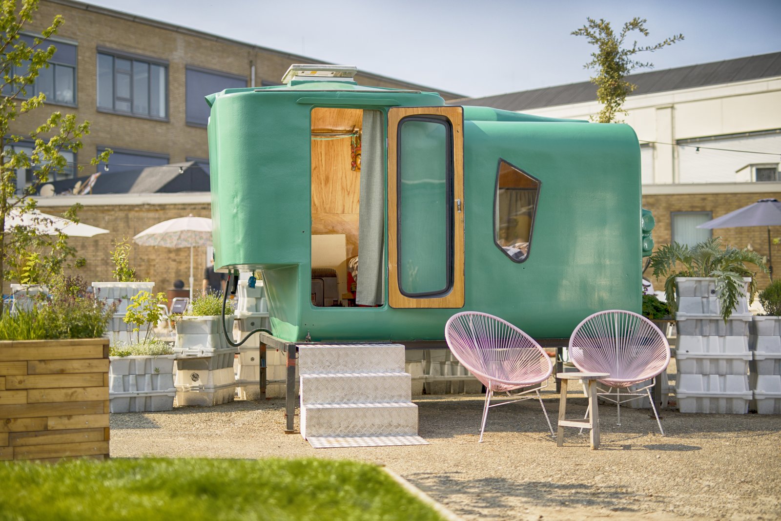 Designeye_q's tweet card. Dutch artists and architects have banded together to create Culture Campsite, where waste materials are reused to create one-0f-a-kind sleeping pods.