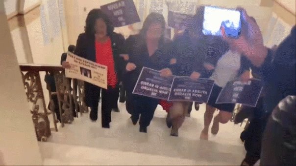 TwistedLibs's tweet card. Democratic lawmakers led by Rep. Pramila Jayapal, D-Wash., stormed House Speaker Mike Johnson's office demanding he swear in Rep.-elect Adelita Grijalva.