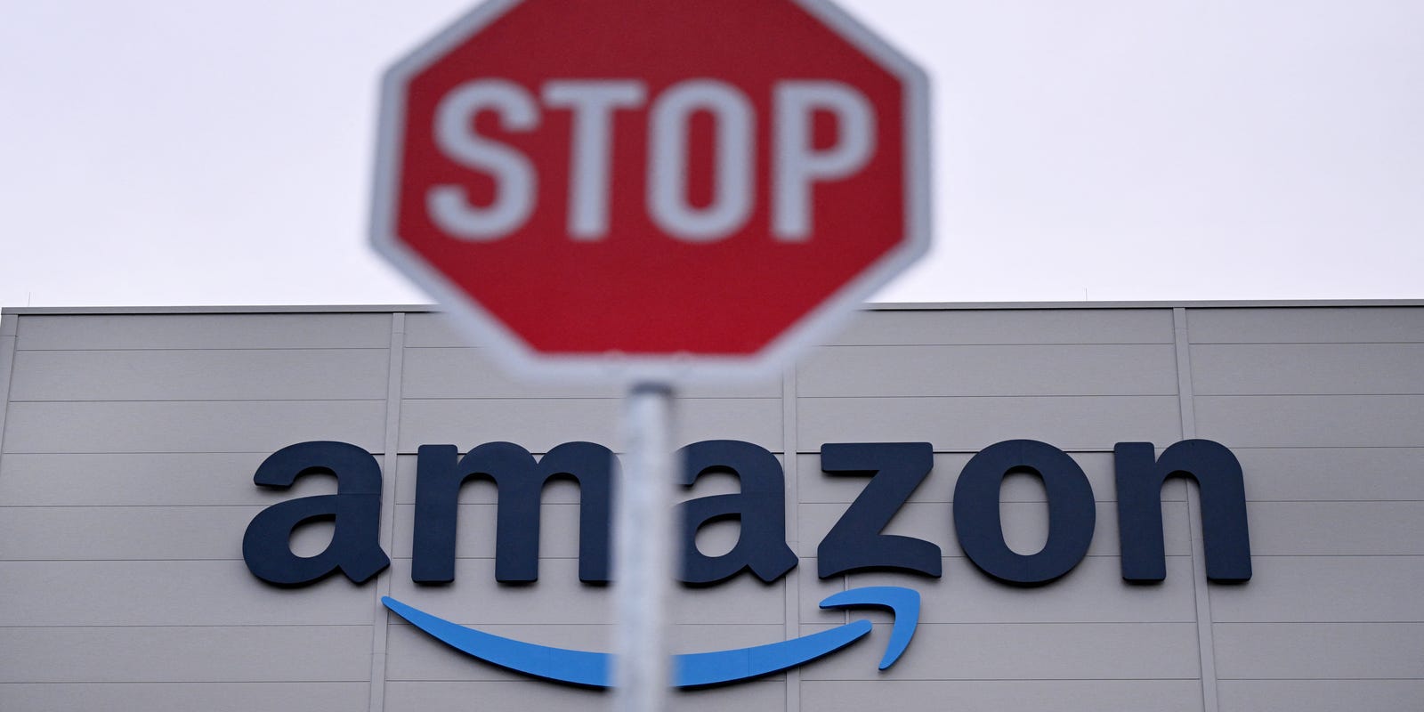 USATODAY's tweet card. The reported layoffs would be the largest corporate downsizing in Amazon's history.