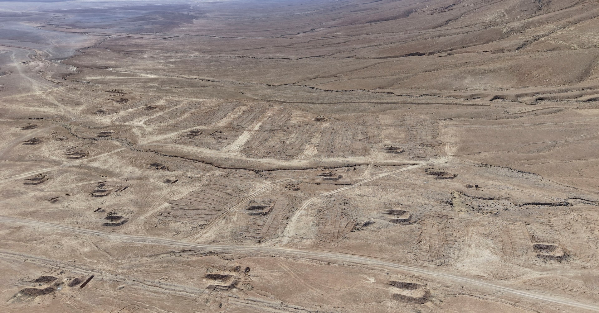 OzKaterji's tweet card. The goal of the clandestine reburial was to hide evidence of atrocities as Bashar Assad tried to regain international standing.