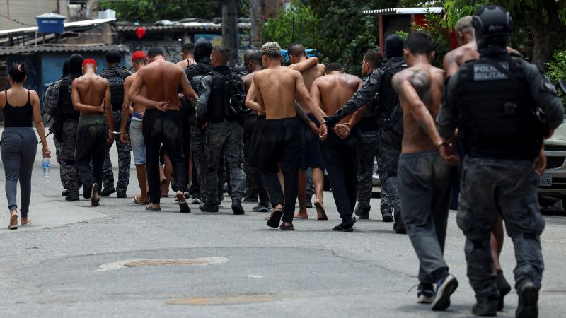 cnnbrk's tweet card. At least 132 people have died in a massive police raid aimed at organized crime in Rio de Janeiro, the regional public defender’s office said on Wednesday. Among the dead are four Brazilian police...