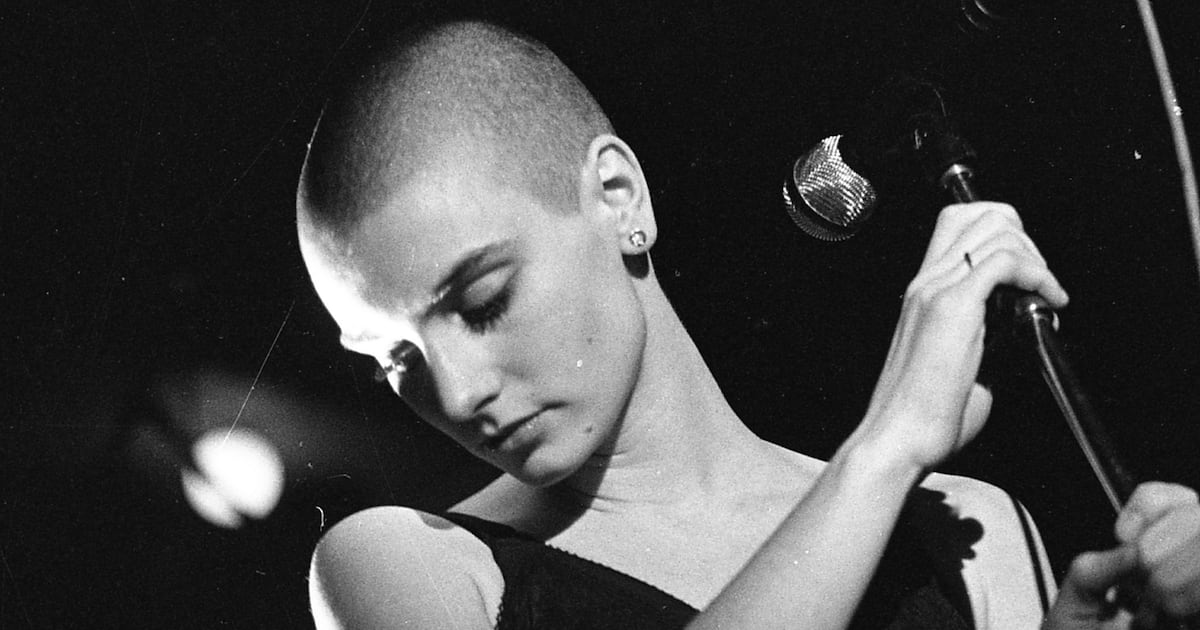 IrishTimes's tweet card. Michael D Higgins leads tributes to Irish musician, saying the country has lost an ‘extraordinarily beautiful, unique voice’