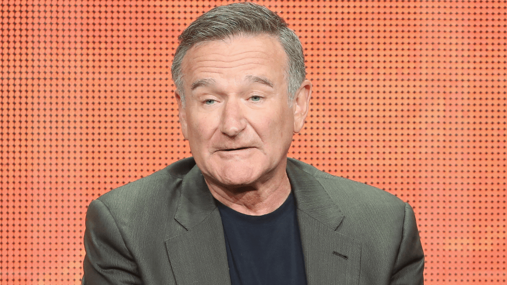 EFMLESS's tweet card. Zelda Williams tells fans not to send her AI recreations of father Robin Williams, calling them "gross."