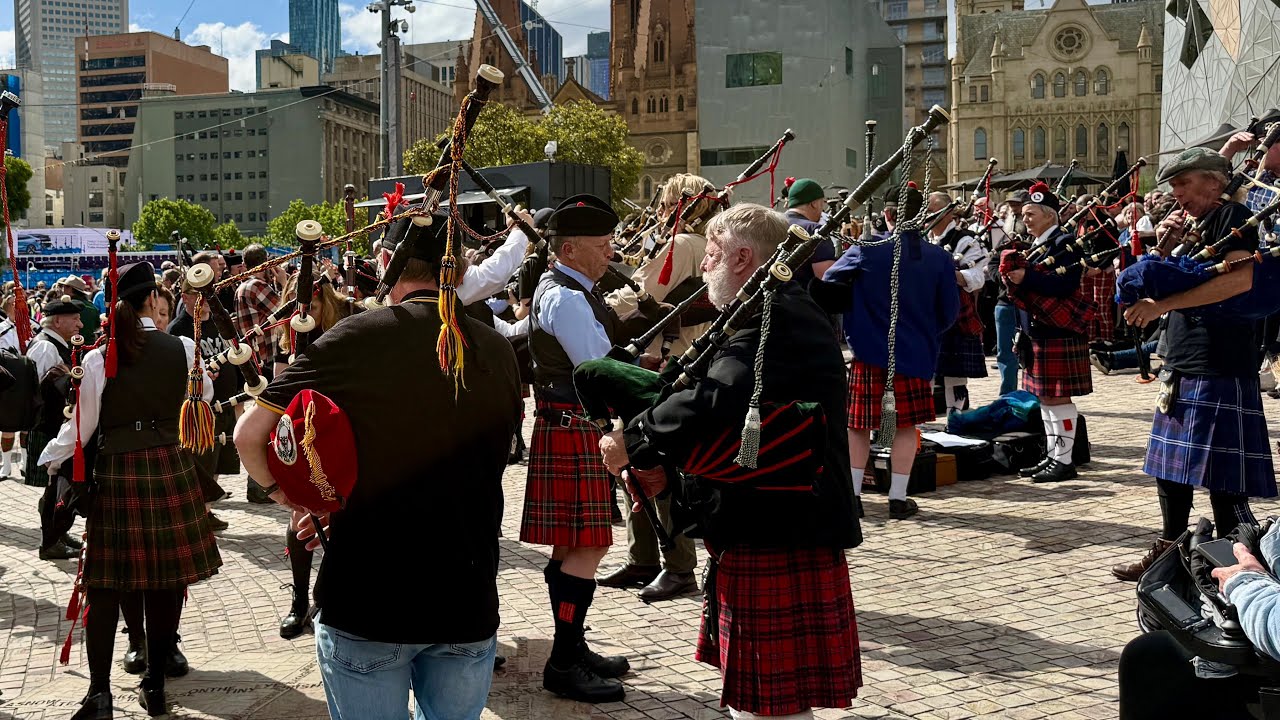 TankVaxxed's tweet card. 374 Bagpipers hit new world record in Melbourne by playing AC/DC's...