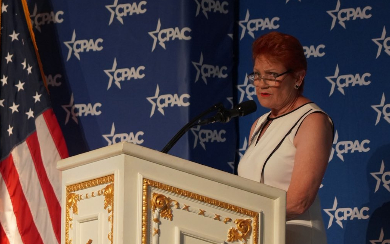 NoticerNews's tweet card. One Nation leader Pauline Hanson has given a speech at a CPAC event at Donald Trump's Mar-a-Lago resort in Florida, warning about mass immigration.