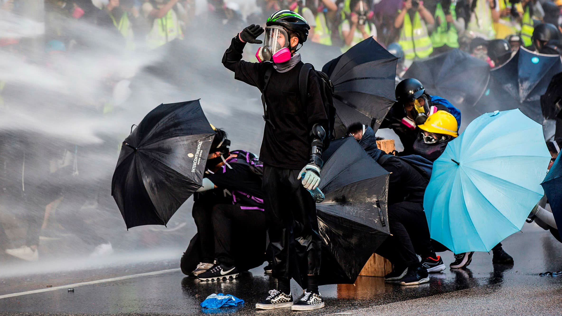 elimeixler's tweet card. Hong Kong protesters have watched their free international city be snuffed out