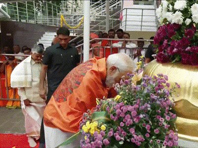 BhaskarEnglish_'s tweet card. PM Modi says, 'World is looking at us as...