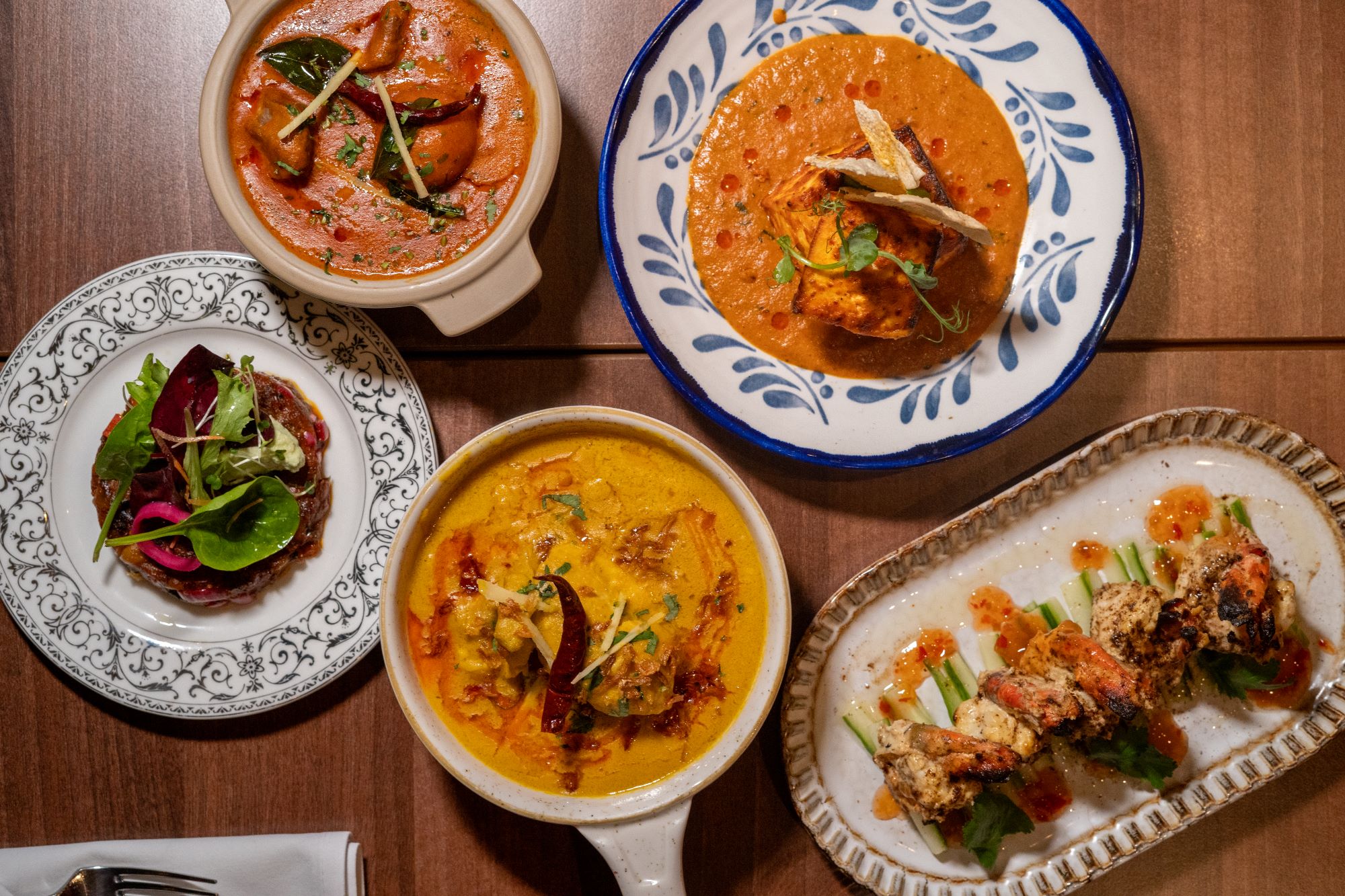 BabesaboutTown's tweet card. The Colonel Saab x Clueless theatrical dining experience offers delicious Indian cuisine with a rom-com twist. It's, like, Cher magic!