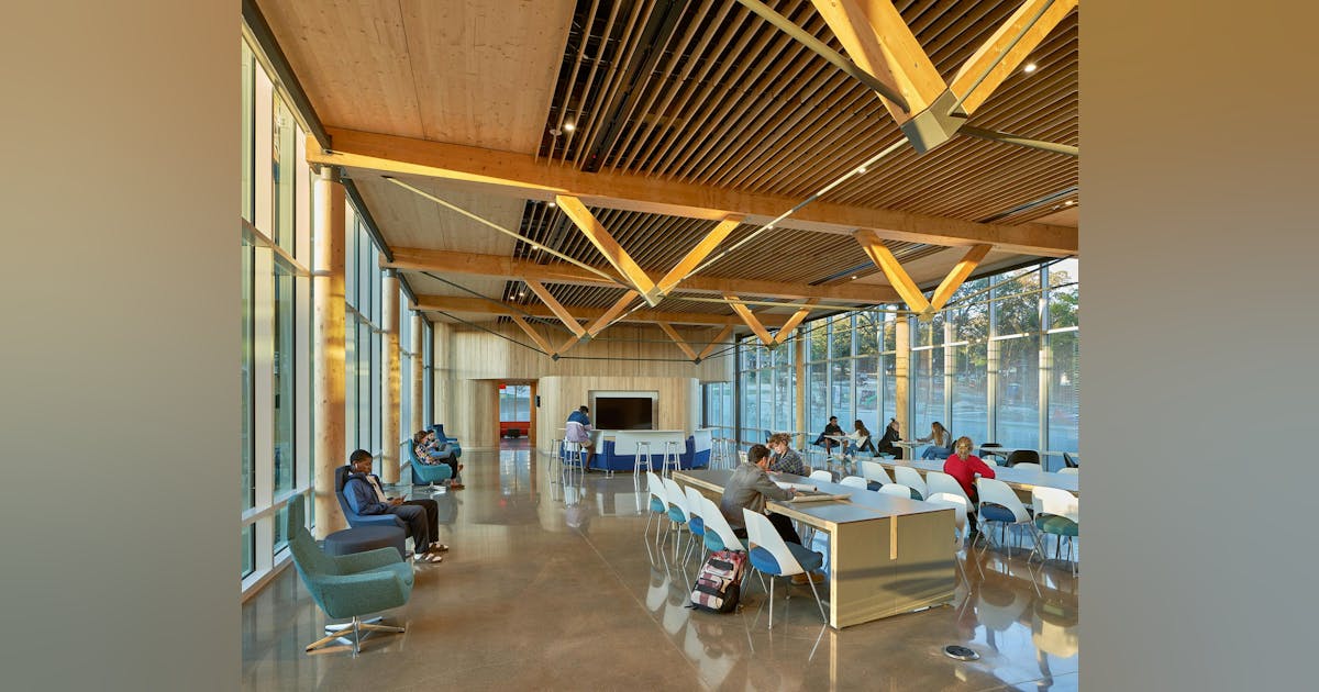LumberBoard's tweet card. Looking back at the past 10 years in mass timber design—since our firm’s first mass timber building, the John W. Olver Design Building at the University of Massachusetts Amherst...
