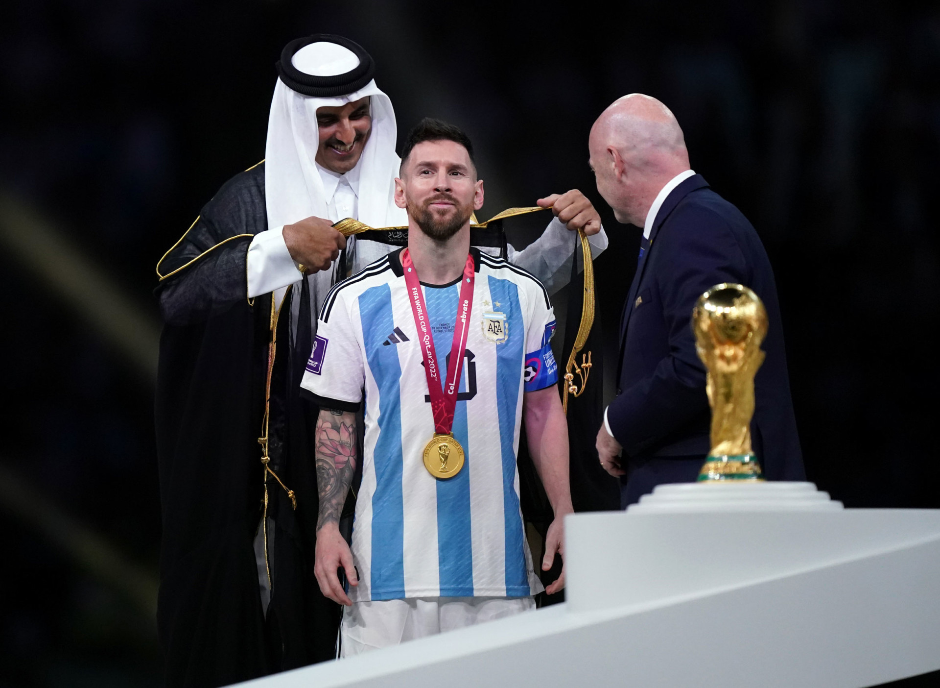 hxhassan's tweet card. ‘Bishtgate,’ featuring the Argentine star and the Qatari emir, bookends the World Cup