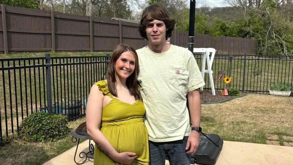 GeorgiebGeorge's tweet card. A father of two was nearly decapitated in front of his wife and left in critical condition by a hatchet-wielding menace as the couple were in the middle of a...