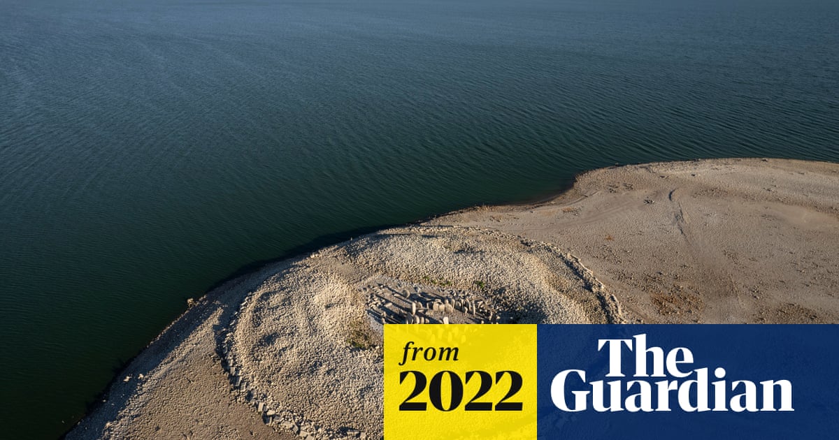 guardian's tweet card. Prehistoric stone circle and 11th-century church uncovered as country’s reservoirs hit 36% of normal capacity