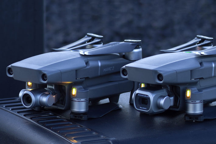 focuspullernet's tweet card. DJI’s new drones mark two firsts: the Mavic 2 Pro is the world’s first drone with an integrated Hasselblad camera, and the Mavic 2 Zoom is the world’s first foldable drone with optical zoom capabil...