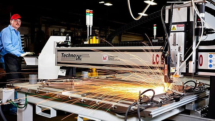 AssemblyMag1's tweet card. Three-axis gantry ensures accurate positioning of studs for manufacturer of commercial kitchen equipment.