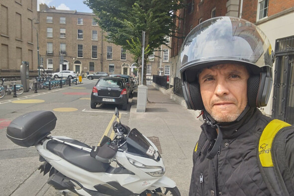 thejournal_ie's tweet card. The 43-year-old dad of two saw the incident unfolding, got off his bike, and used his helmet to stop the attack.