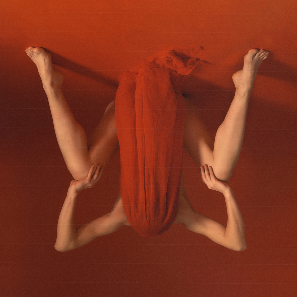 JuliaVale_Art's tweet card. The body as parchment. Each fold a glyph. Each gesture a mark in silence. There is no subject. Only surface. No narrative. Only syntax. Red is not a color. It is the signal. Between tension and...