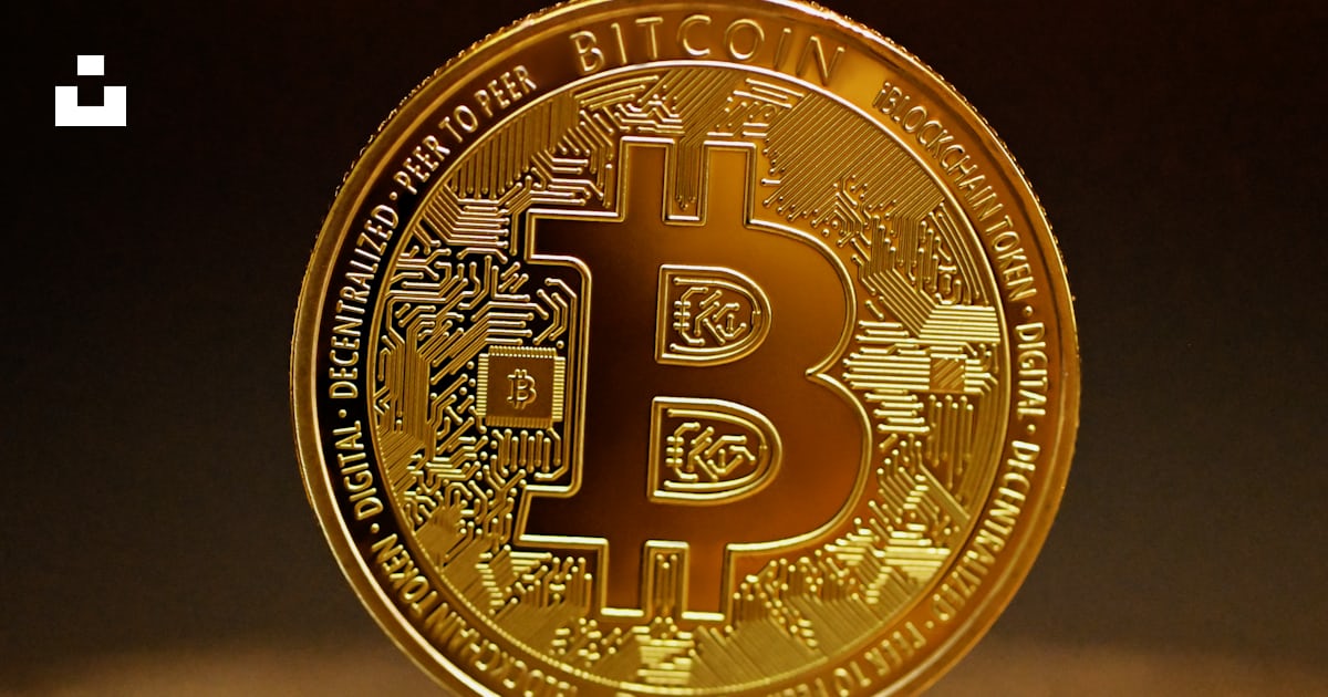 raymondlweb3's tweet card. A bitcoin is standing alone – Download this photo by Kanchanara on Unsplash