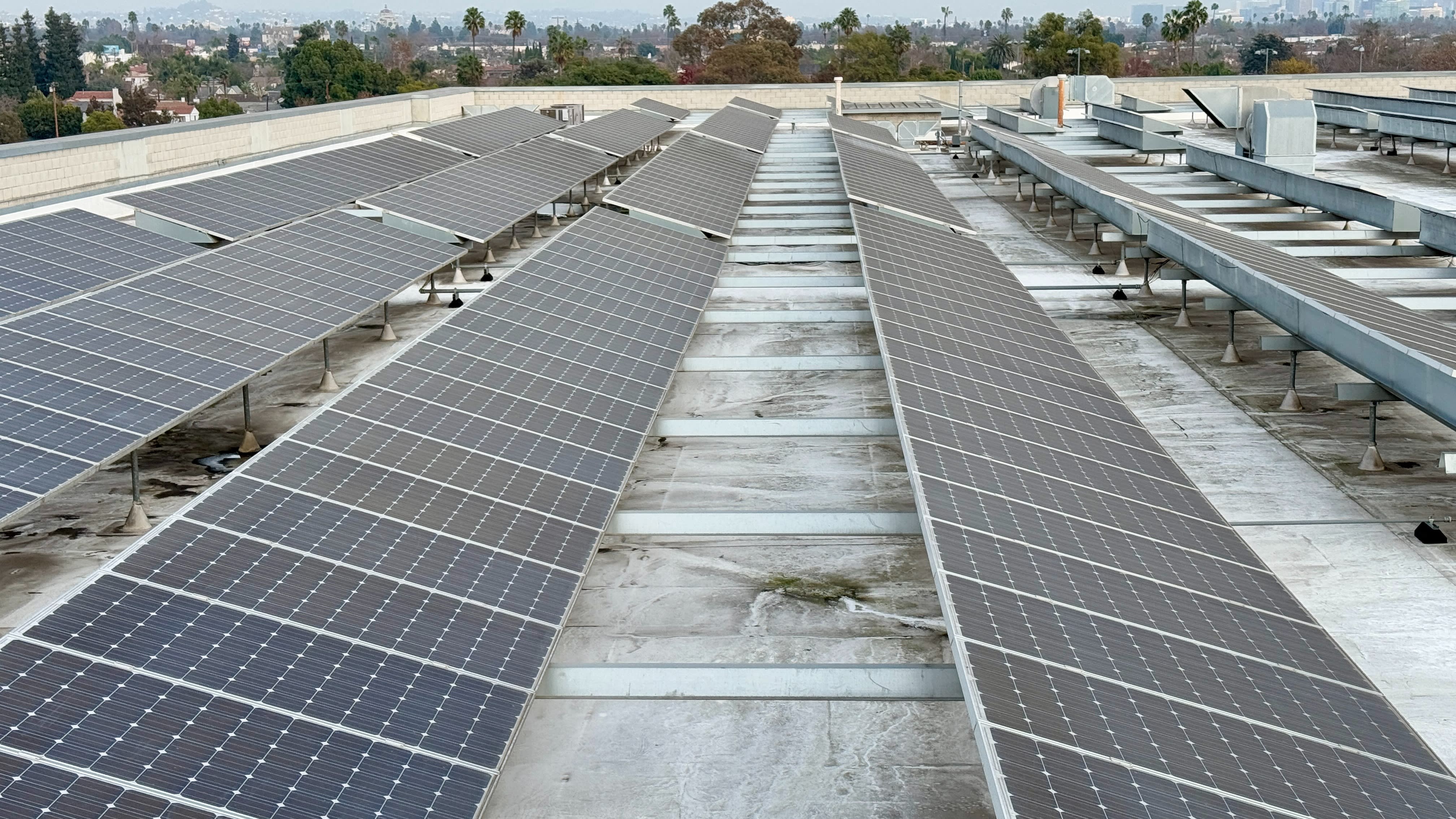 aeberman12's tweet card. Analysts say the president’s removal of clean energy tax credits has hurt the value of renewable projects