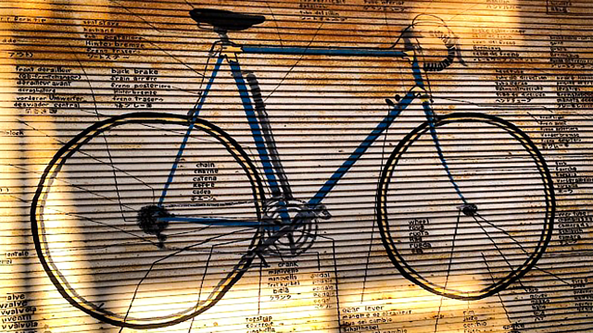 RandyLoBasso's tweet card. A liquor company was using bicycles as advertising billboards.